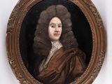 portrait of a man in a brown coat and a brown cloak