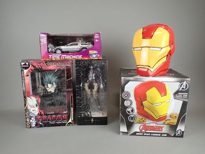two boxes of action figures and a box of action figures