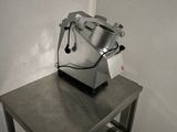 an image of a mixer on a table in a room