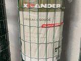 a roll of green fence that has been wrapped in plastic