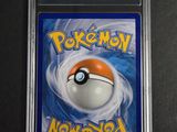 a close up of a pokemon card on a table