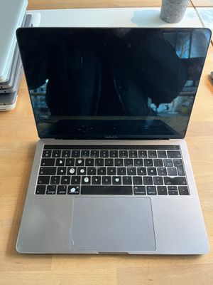 a laptop that is sitting on a table