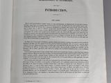 an open book with a black and white image on it