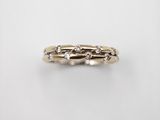a close up of a gold ring with diamonds on a white background