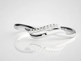 a white gold ring with diamonds on a reflective surface
