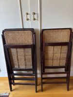 Trois chaises pliantes, assise et dossier canné