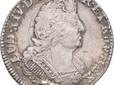 an old silver coin with a crown on it