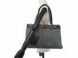 the handbag is sitting on a mannequin mannequin mannequin mannequin mannequin mannequin mannequin mannequin mann