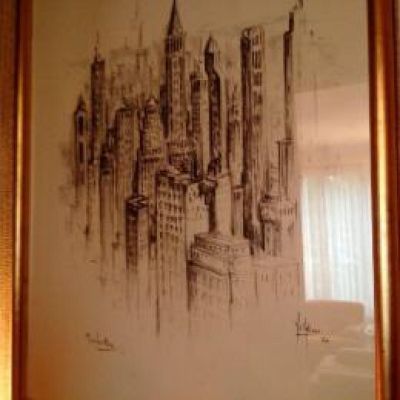 drawing of a picture of a city in a frame on a wall
