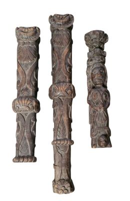 three wooden carvings of different shapes and sizes on a white background