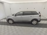 a picture of a silver car in a garage