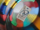 a close up of a glass with a sticker on it
