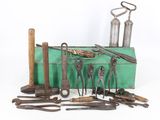 many tools that are sitting on a green box