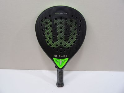 a close up of a tennis racket on a white surface