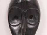 an image of a black mask on a white background