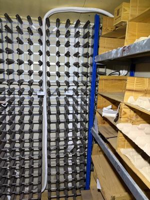 a room with shelves and shelves with many different types of tools