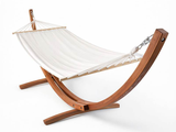 a hammock on a wooden stand on a white background
