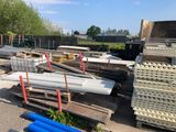 a lot of construction materials that are sitting on the ground