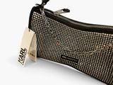black and silver purse with chain strap and tag on white background