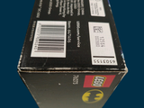 a box of legos sitting on top of a blue surface