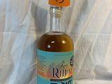 a bottle of rum that is sitting on a table
