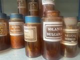 many jars of food that are sitting on a counter