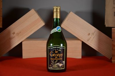 a bottle of wine that is sitting on a table
