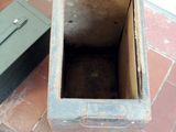 a box with a shovel and a box with a box inside of it