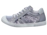 a close up of a child ' s shoe with silver sequins