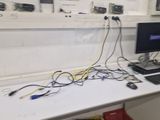 a desk with a computer and a monitor on it