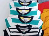 a lot of shirts that are stacked on top of each other