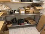 many boxes and boxes on the shelves in the room