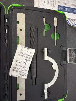 a black case with tools in it on a table
