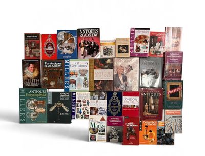 a lot of books that are stacked on top of each other