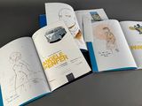 an open book with a drawing of a woman and a bus