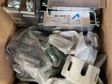 a box full of assorted metal items in it