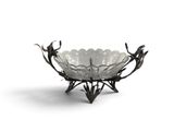 an image of a glass bowl with leaves on it