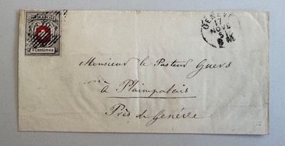 un gros plan d'un morceau de papier sur lequel est apposé un timbre