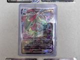 pokemon cards are lined up in a row on a white surface