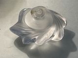 a glass object that is sitting on a table