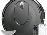 a close up of a robot vacuum cleaner with a remote control