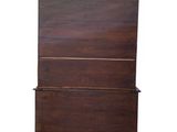 an image of a wooden chest of drawers on a white background