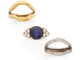 trois bagues et une bague sertie d'un saphir