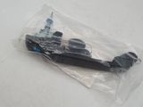 a black toothbrush in a plastic bag on a table