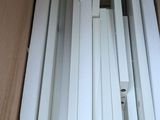 many pieces of white wood in a box
