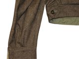 a close up of a jacket and pants on a white background