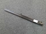 a close up of two metal rods on a gray surface