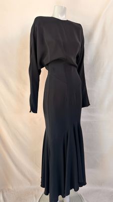 the back of a black dress on a mannequin mannequin mannequin mannequin mannequin mannequin mannequin mannequin