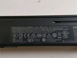 an image of a laptop battery that is sitting on a table