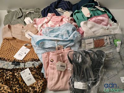 a box full of clothes that are sitting on a table
